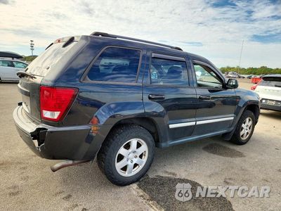 Trzecie zdjęcie samochodu z tyłu: 2010 JEEP GRAND CHEROKEE LAREDO VIN:1J4PR4GK1AC147294 - miniatura
