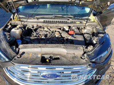 Zdjęcie 11 z 12 samochodu: 2019 FORD EDGE TITANIUM VIN:2FMPK4K95KBC23417 - miniatura