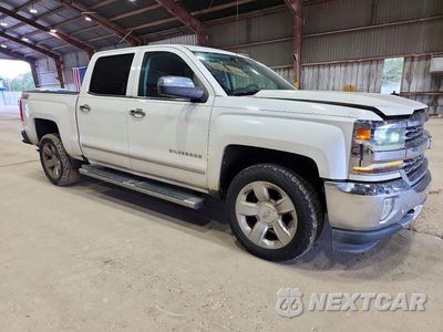Czwarte zdjęcie samochodu z boku: 2017 CHEVROLET SILVERADO C1500 LTZ VIN:3GCPCSEC6HG274301 - miniatura