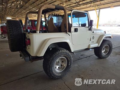 Trzecie zdjęcie samochodu z tyłu: 1999 JEEP WRANGLER / TJ SAHARA VIN:1J4FY49SXXP444643 - miniatura