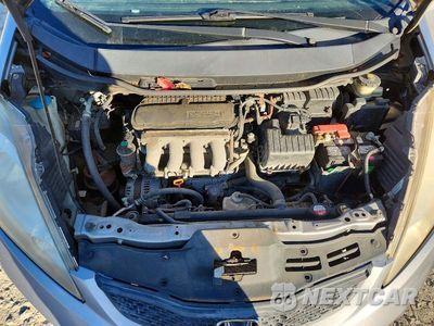 Zdjęcie 11 z 12 samochodu: 2010 HONDA FIT SPORT VIN:JHMGE8H46AS007304 - miniatura