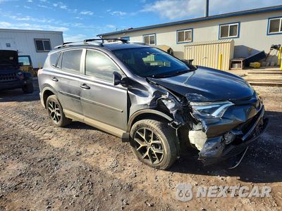 Czwarte zdjęcie samochodu z boku: 2017 TOYOTA RAV4 SE VIN:JTMNFREV6HJ714797 - miniatura