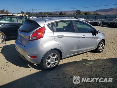 Trzecie zdjęcie samochodu z tyłu: 2015 FORD FIESTA SE VIN:3FADP4EJ7FM162502 - miniatura