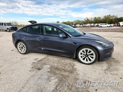 Czwarte zdjęcie samochodu z boku: 2023 TESLA MODEL 3 VIN:5YJ3E1EA9PF459772 - miniatura