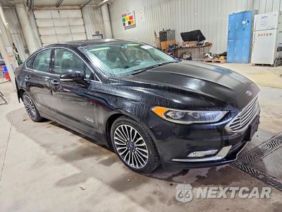 Czwarte zdjęcie samochodu z boku: 2017 FORD FUSION SE PHEV VIN:3FA6P0PU4HR198968 - miniatura