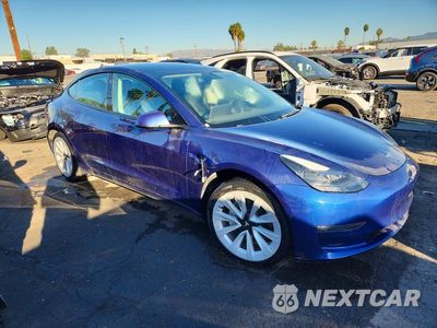 Czwarte zdjęcie samochodu z boku: 2022 TESLA MODEL 3 VIN:5YJ3E1EA3NF371622 - miniatura