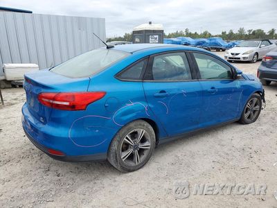Trzecie zdjęcie samochodu z tyłu: 2017 FORD FOCUS SE VIN:1FADP3FE5HL214127 - miniatura