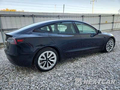 Trzecie zdjęcie samochodu z tyłu: 2022 TESLA MODEL 3 VIN:5YJ3E1EA5NF370603 - miniatura