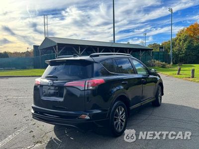 Trzecie zdjęcie samochodu z tyłu: 2018 TOYOTA RAV4 HYBRID LE VIN:JTMRJREV5JD212545 - miniatura