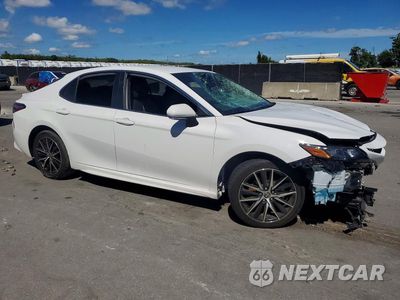 Czwarte zdjęcie samochodu z boku: 2024 TOYOTA CAMRY SE VIN:4T1G11AK9RU886953 - miniatura