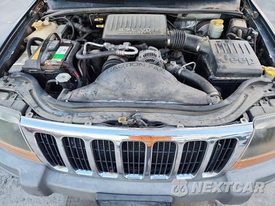 Zdjęcie 12 z 13 samochodu: 2000 JEEP GRAND CHEROKEE LAREDO VIN:1J4GW48NXYC168947 - miniatura