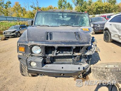 Piąte zdjęcie samochodu w środku: 2004 HUMMER H2 VIN:5GRGN23U04H114421 - miniatura