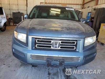 Piąte zdjęcie samochodu w środku: 2006 HONDA RIDGELINE RTL VIN:2HJYK16576H531413 - miniatura