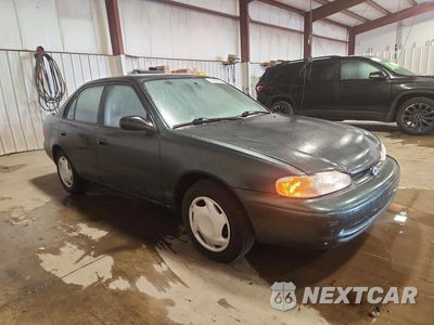 Czwarte zdjęcie samochodu z boku: 2001 CHEVROLET GEO PRIZM BASE VIN:1Y1SK52821Z412433 - miniatura