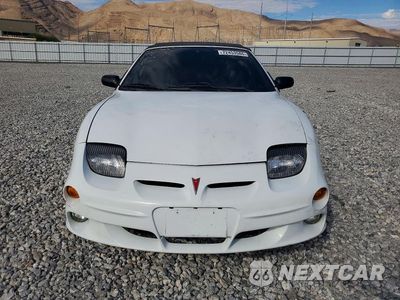 Piąte zdjęcie samochodu w środku: 2000 PONTIAC SUNFIRE GT VIN:4G2JB32T3YB200218 - miniatura