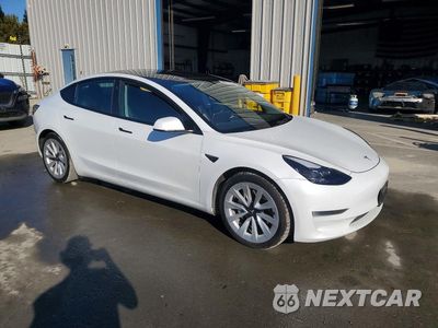 Czwarte zdjęcie samochodu z boku: 2022 TESLA MODEL 3 VIN:5YJ3E1EA7NF371638 - miniatura