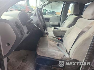 Zdjęcie 7 z 12 samochodu: 2004 FORD F150 VIN:1FTRF12W44NB76880 - miniatura