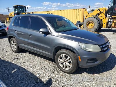 Czwarte zdjęcie samochodu z boku: 2013 VOLKSWAGEN TIGUAN S VIN:WVGAV3AXXDW592458 - miniatura