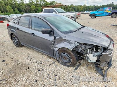 Czwarte zdjęcie samochodu z boku: 2018 FORD FOCUS S VIN:1FADP3E27JL244355 - miniatura