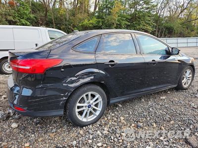 Trzecie zdjęcie samochodu z tyłu: 2016 FORD FOCUS SE VIN:1FADP3F20GL395268 - miniatura