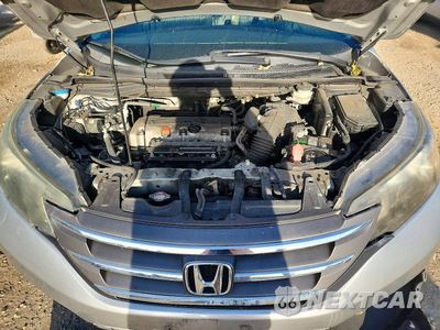 Zdjęcie 12 z 13 samochodu: 2014 HONDA CR-V LX VIN:2HKRM4H33EH718282 - miniatura