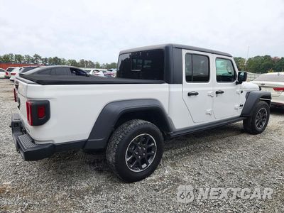 Trzecie zdjęcie samochodu z tyłu: 2020 JEEP GLADIATOR SPORT VIN:1C6HJTAGXLL121190 - miniatura