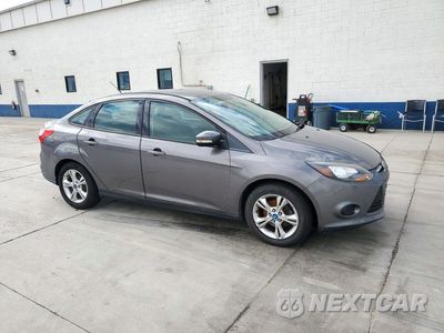 Czwarte zdjęcie samochodu z boku: 2013 FORD FOCUS SE VIN:1FADP3F28DL185044 - miniatura