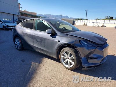 Czwarte zdjęcie samochodu z boku: 2023 TESLA MODEL Y VIN:7SAYGDEE7PF839765 - miniatura