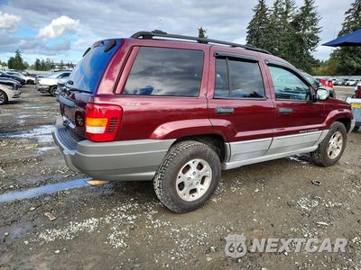 Trzecie zdjęcie samochodu z tyłu: 2000 JEEP GRAND CHEROKEE LAREDO VIN:1J4GW48S6YC122439 - miniatura