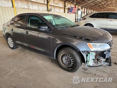 Czwarte zdjęcie samochodu z boku: 2014 VOLKSWAGEN JETTA BASE VIN:3VW2K7AJ0EM324859 - miniatura