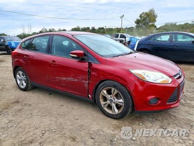 Czwarte zdjęcie samochodu z boku: 2014 FORD FOCUS SE VIN:1FADP3K29EL450772 - miniatura