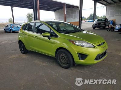 Czwarte zdjęcie samochodu z boku: 2011 FORD FIESTA SE VIN:3FADP4EJ1BM228441 - miniatura