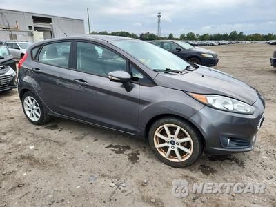 Czwarte zdjęcie samochodu z boku: 2015 FORD FIESTA SE VIN:3FADP4EJ4FM132731 - miniatura