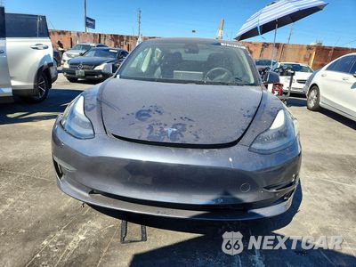 Piąte zdjęcie samochodu w środku: 2021 TESLA MODEL 3 VIN:5YJ3E1EA4MF069397 - miniatura