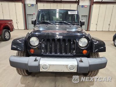 Piąte zdjęcie samochodu w środku: 2012 JEEP WRANGLER UNLIMITED SAHARA VIN:1C4BJWEG8CL245825 - miniatura