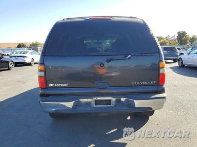 Zdjęcie 6 z 12 samochodu: 2004 CHEVROLET TAHOE C1500 VIN:1GNEC13V14R121798 - miniatura