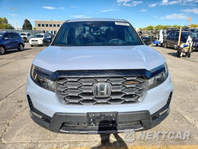 Piąte zdjęcie samochodu w środku: 2026 HONDA RIDGELINE TRAIL SPORT VIN:5FPYK3F63TB005913 - miniatura