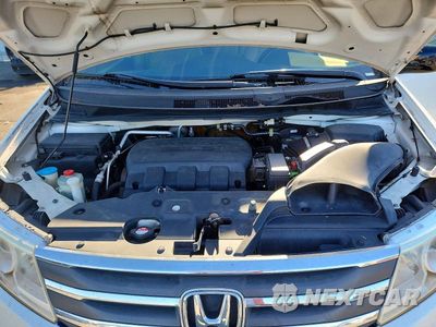 Zdjęcie 12 z 13 samochodu: 2012 HONDA ODYSSEY TOURING VIN:5FNRL5H9XCB009728 - miniatura