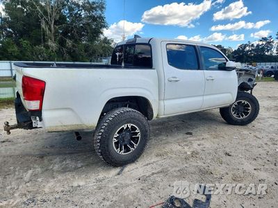 Trzecie zdjęcie samochodu z tyłu: 2019 TOYOTA TACOMA SR V6 VIN:3TMCZ5AN4KM224933 - miniatura