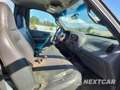 Zdjęcie 10 z 12 samochodu: 2001 FORD F-150 VIN:1FTRF18W41NB26421 - miniatura