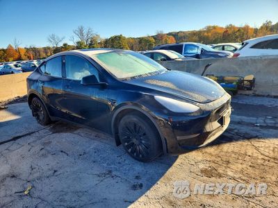 Czwarte zdjęcie samochodu z boku: 2023 TESLA MODEL Y VIN:7SAYGDEE7PA181796 - miniatura