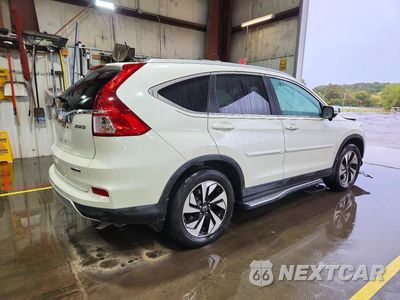 Trzecie zdjęcie samochodu z tyłu: 2016 HONDA CR-V TOURING VIN:5J6RM4H98GL061797 - miniatura