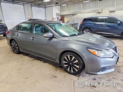 Czwarte zdjęcie samochodu z boku: 2018 NISSAN ALTIMA 2.5 SL VIN:1N4AL3APXJC183244 - miniatura