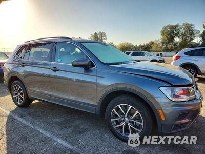 Czwarte zdjęcie samochodu z boku: 2019 VOLKSWAGEN TIGUAN SE VIN:3VV3B7AX8KM200721 - miniatura