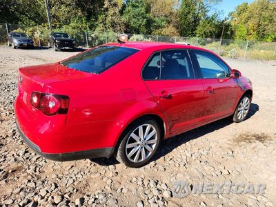 Trzecie zdjęcie samochodu z tyłu: 2010 VOLKSWAGEN JETTA WOLFSBURG VIN:3VWRA7AJ6AM053558 - miniatura