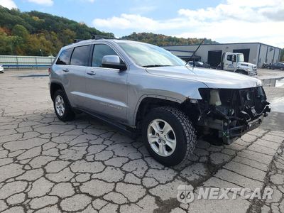 Czwarte zdjęcie samochodu z boku: 2014 JEEP GRAND CHEROKEE LAREDO VIN:1C4RJFAG6EC280239 - miniatura