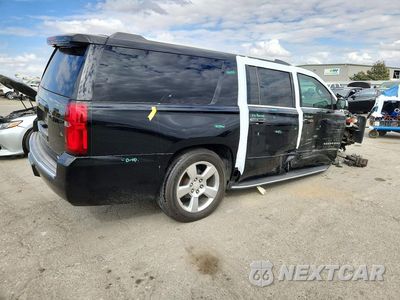 Trzecie zdjęcie samochodu z tyłu: 2017 CHEVROLET SUBURBAN C1500 PREMIER VIN:1GNSCJKC7HR156077 - miniatura