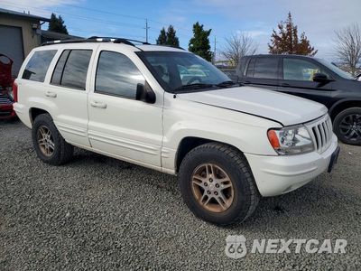 Czwarte zdjęcie samochodu z boku: 1999 JEEP GRAND CHEROKEE VIN:1J4GW68N6XC638966 - miniatura
