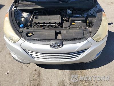 Zdjęcie 12 z 14 samochodu: 2012 HYUNDAI TUCSON GLS VIN:KM8JU3AC0CU389220 - miniatura