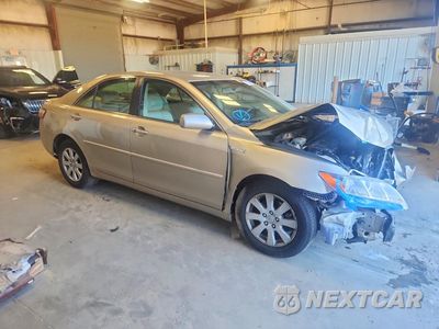 Czwarte zdjęcie samochodu z boku: 2007 TOYOTA CAMRY HYBRID VIN:JTNBB46K673028957 - miniatura